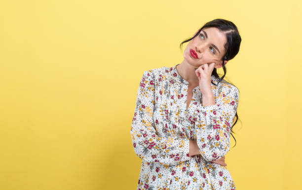 istock Young woman in a thoughtful pose 1191152725