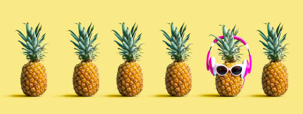 istock One out unique pineapple wearing headphones 1191152873