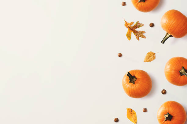 istock Autumn pumpkins with leaves 1191152923