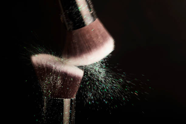 istock Cosmetics brush and colorful makeup powder 1191156076