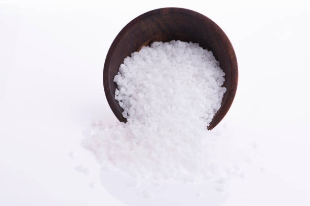 istock Salt in spoon with white background 1191156290