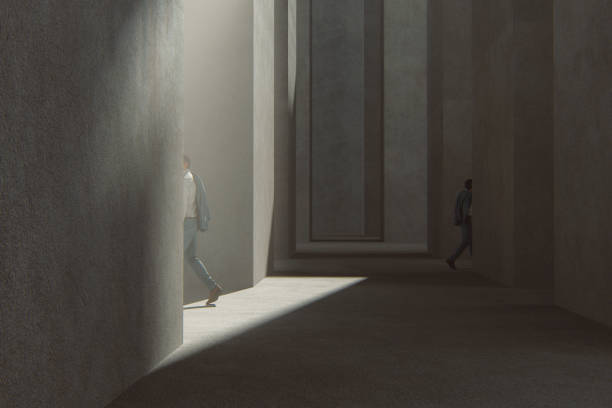istock Men walking in dark concrete alleys 1191157070