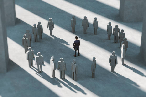 istock Man standing in a group of people 1191157672