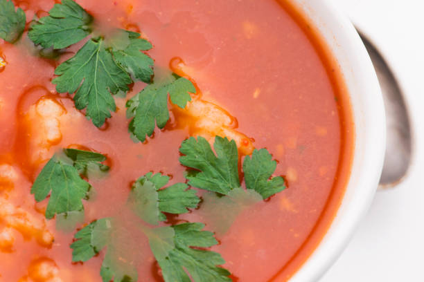 Tomato soup with rice decorated with parsley
