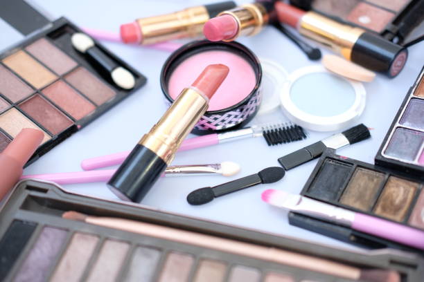 istock Close up lipstick and makeup on white background 1191164549