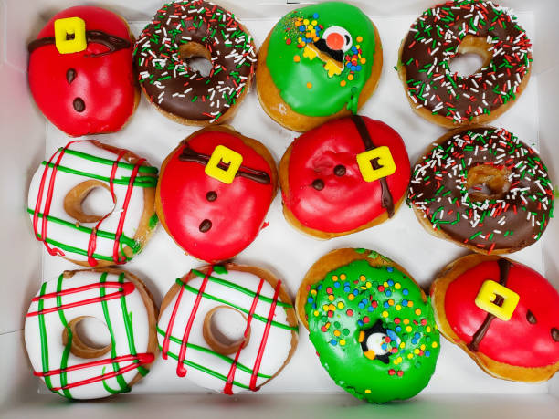 istock Colorful Christmas donuts in a box 1191166329