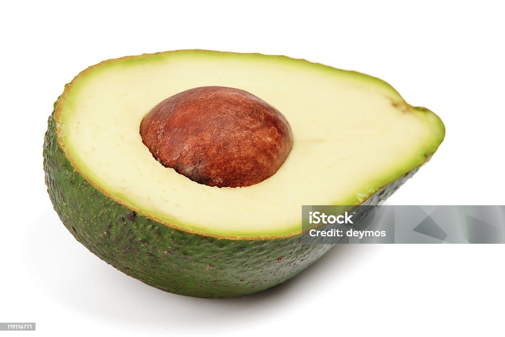 Die Hälfte avocado mit Feuerstelle, isoliert auf weißem Hintergrund - Lizenzfrei Avocado Stock-Foto