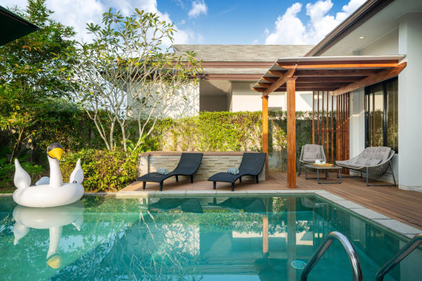 istock Swimming pool in tropical garden pool villa feature floating balloon 1191167784