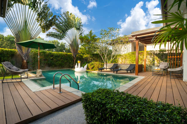 istock Swimming pool in tropical garden pool villa feature floating balloon 1191167785