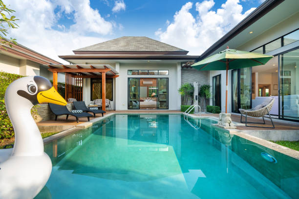 istock Swimming pool in tropical garden pool villa feature floating balloon 1191167809