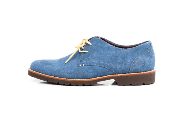 istock Blue suede leather men shoe isolated on a white background. Side view 1191170017