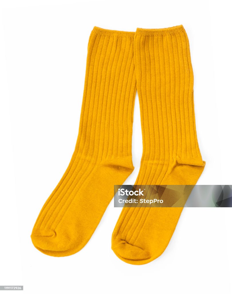 Yellow pair of socks isolated on a white background, Top view Sock Stock Photo