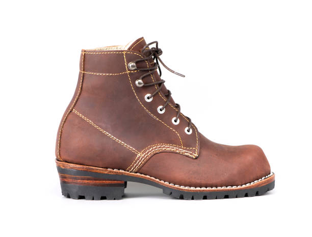 istock Men fashion brown boot isolated on a white background. Side view 1191173995