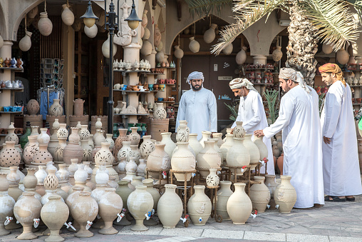 Nizwa, Oman, December 2015: omani men at the old Nizwa market
