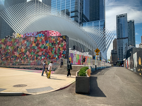 Hektad, a well known street artist painted the colorful heart mural as part of the Two World Trade Center Mural Project in 2018. The Mural Project brought well known street artists to decorate the large sheds surrounding the empty lot that will become Two World Trade Center.
