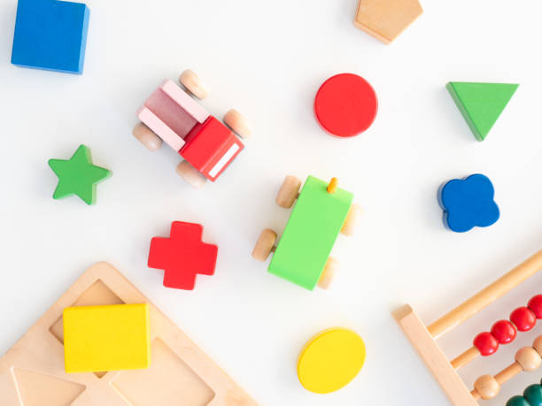 istock kids learning concept with stacking toys on white table background. 1191181421