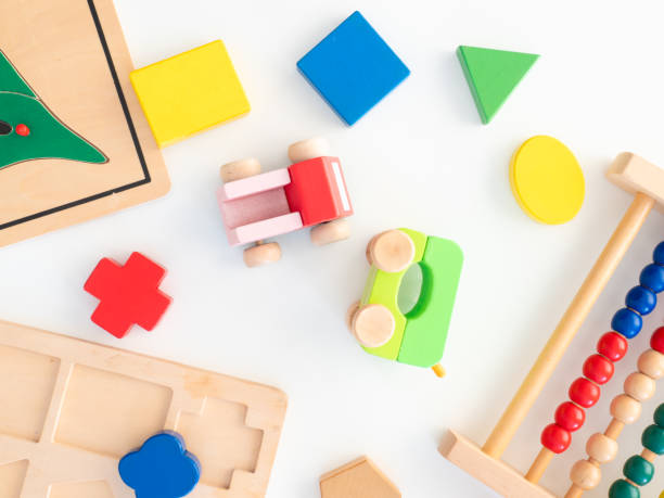 istock kids learning concept with stacking toys on white table background. 1191181427