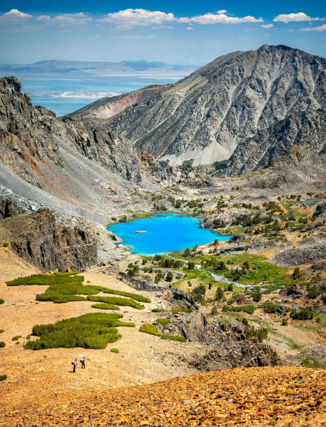 California Glacial Lake A surreal colored lake in the Sierra Nevada. Discovered by accident while hiking and climbing far off trail. Mono Lake stock pictures, royalty-free photos & images