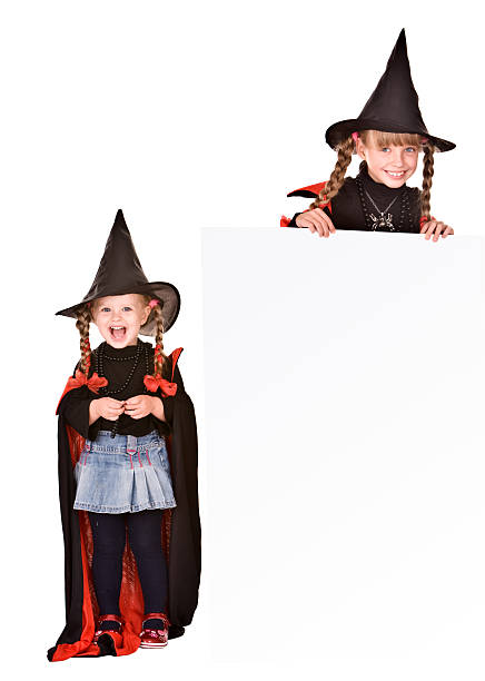 istock Children in Halloween witch costume with banner. 119118465