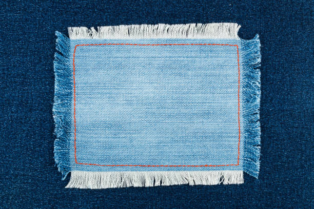 Denim frames background textured isolated on black.
