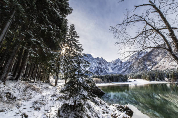 istock first snow at the mountain lake 1191186039