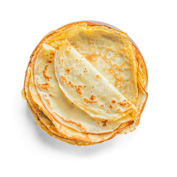 Crepes Crepes (Russian Blini) isolated on white background, top view. Homemade thin crepes for breakfast or dessert. crêpe pancake photos stock pictures, royalty-free photos & images