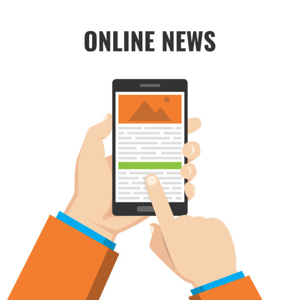 istock Hand holding phone with newspaper, news website. 1191191631