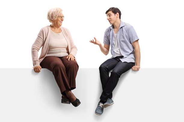 istock Grandmother and grandson sitting on a panel and having a conversation 1191191986