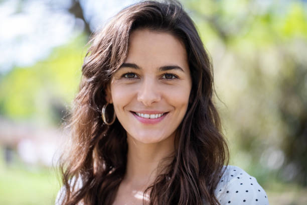 Beautiful female smiling at park