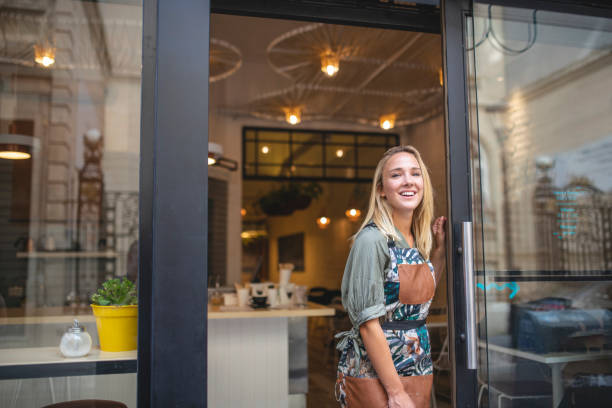 istock Buenos Aires Cafe Owner Standing at Open Front Door 1191194157
