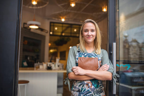 istock Friendly Argentine Cafe Owner Standing at Open Front Door 1191194159