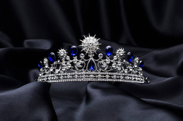 istock silver tiara with diamonds and sapphires on black silk 1191194317