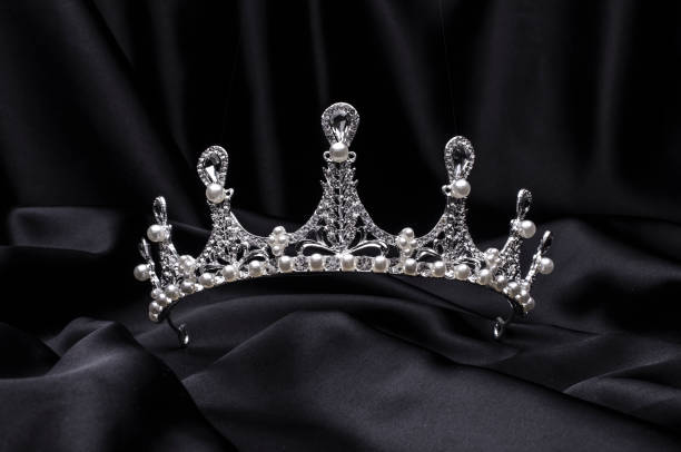 istock tiara with pearls isolated on a black silk 1191194331