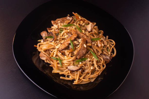 istock noodles with beef and shiitake mushrooms on the plate 1191195105