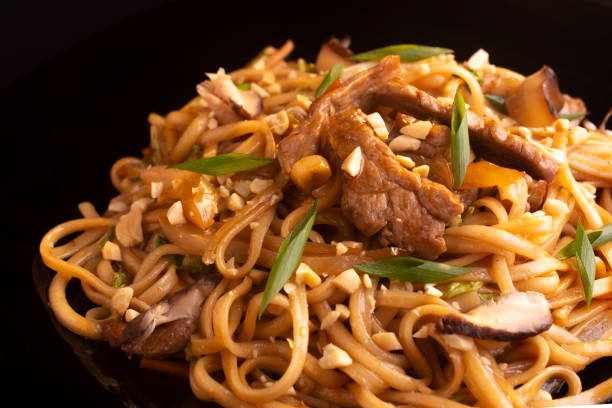 istock noodles with beef and shiitake mushrooms macro 1191195126