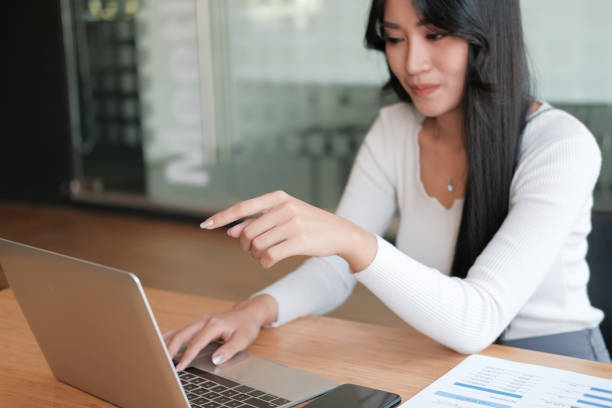 istock businesswoman freelancer working with computer. woman analyzing data. student studying doing assignment 1191196244