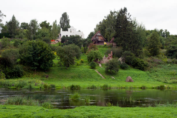 istock Village house by tranquil river 1191196415