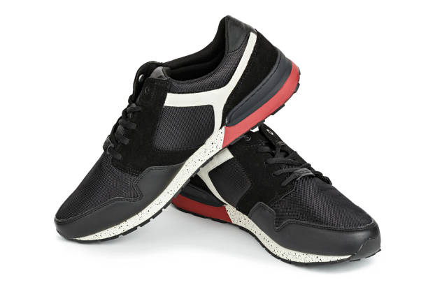 istock New black men's sneakers on a white background. 1191197867