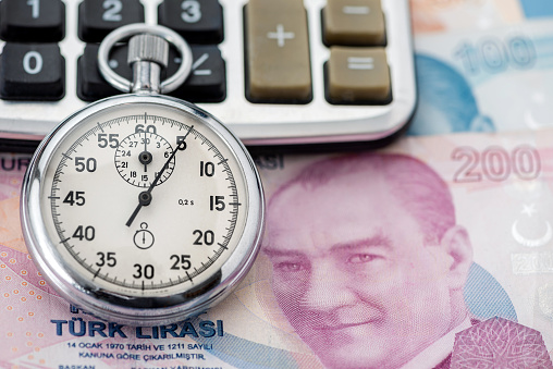 Time is money, Turkish lira and stop watch