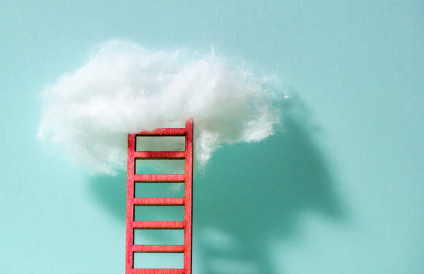 istock Red ladder to the clouds metaphor. Concept for growth and internet cloud networking. 1191200313