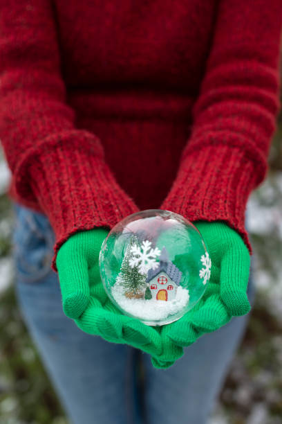 istock Crystal christmas ball with house and snow inside. 1191201455