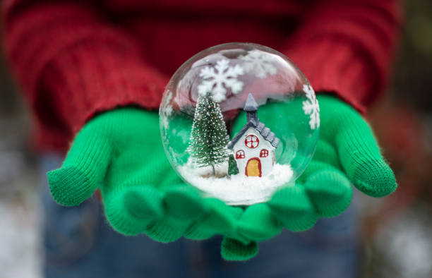 istock Crystal christmas ball with house and snow inside. 1191201472