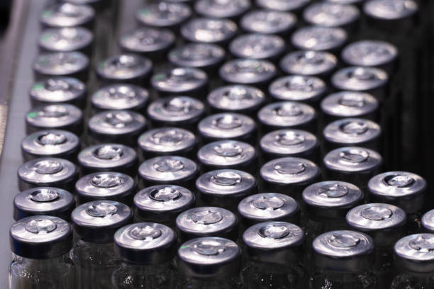 istock Medical bottles on the conveyor 1191202182