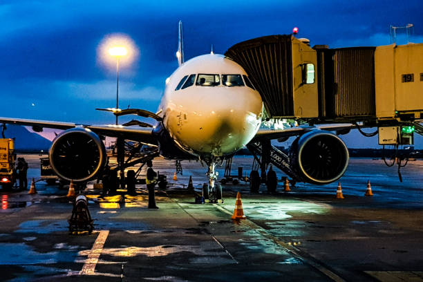 istock Airplane flight departure at night 1191202262