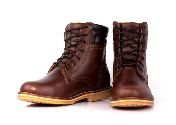 istock Man fashion leather brown boot isolated on a white background. 1191205935
