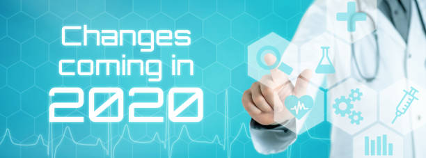 istock Doctor touching an icon on a futuristic interface - Changes coming in 2020 1191209352