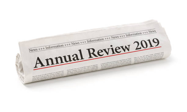 istock Rolled newspaper with the headline Annual review 2019 1191209384
