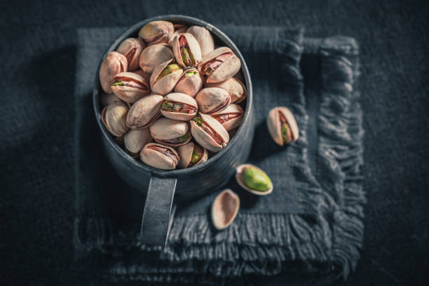 Brown and green pistachios as a healthy and good snack