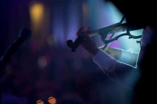 Close-up of unrecognizable musician playing electric violin, copy space, Nikon Z7
