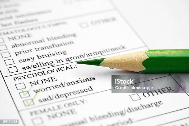 Closeup Of Health History Paperwork And A Green Pencil Stock Photo - Download Image Now